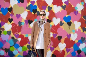 A Day In The Lalz; Fashion Blogger; Camel Wool Coat; J. Crew Coat; Leather Leggings; NYC; Heart Wall; BaubleBar Cornicello Pendant; Karen Walker Special Fit Harvest Sunglasses; Kate Spade Black Beau Bag; Modesty; Haute Hijab Scarf; Streetstyle fashion