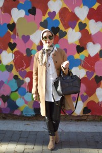 A Day In The Lalz; Fashion Blogger; Camel Wool Coat; J. Crew Coat; Leather Leggings; NYC; Heart Wall; BaubleBar Cornicello Pendant; Karen Walker Special Fit Harvest Sunglasses; Kate Spade Black Beau Bag; Modesty; Haute Hijab Scarf; Streetstyle fashion