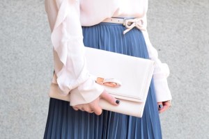 A Day In The Lalz; Pleated Blue Midi Skirt; Ruffle-Front Blouse; Rose Quartz and Serenity; Ted Baker Pink Clutch; Bow Belt; Fashion Blogger; Midi Skirt; Hijabi; Modest Fashion;